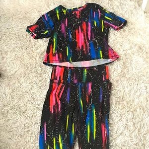 I am selling a galaxy tie-dye shirts a pants. Size M